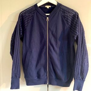 Bomber jacket with eyelet fabric in the arms